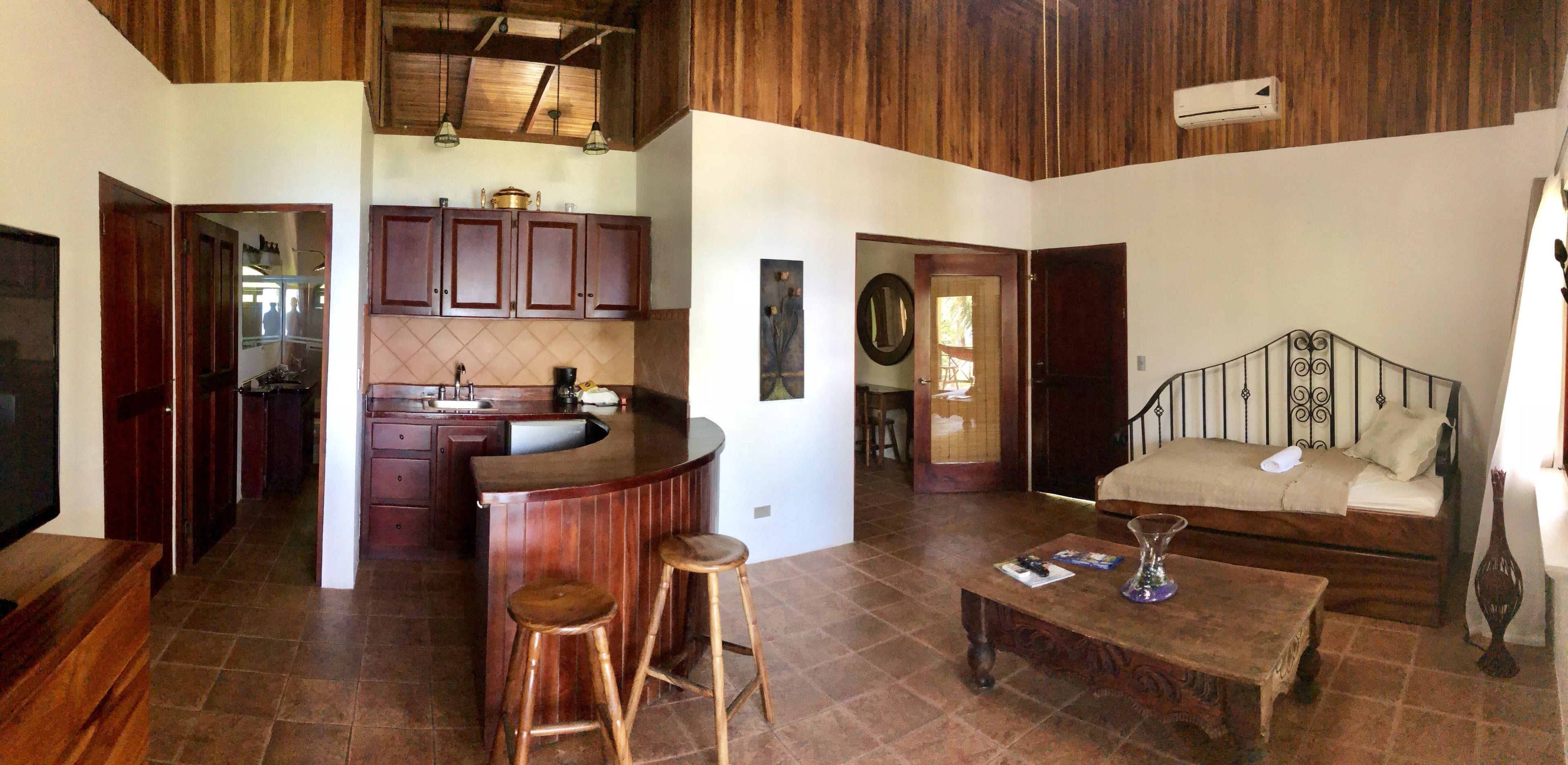 luxury double or twin room, 2 bedrooms | living room | 50-inch tv with cable channels