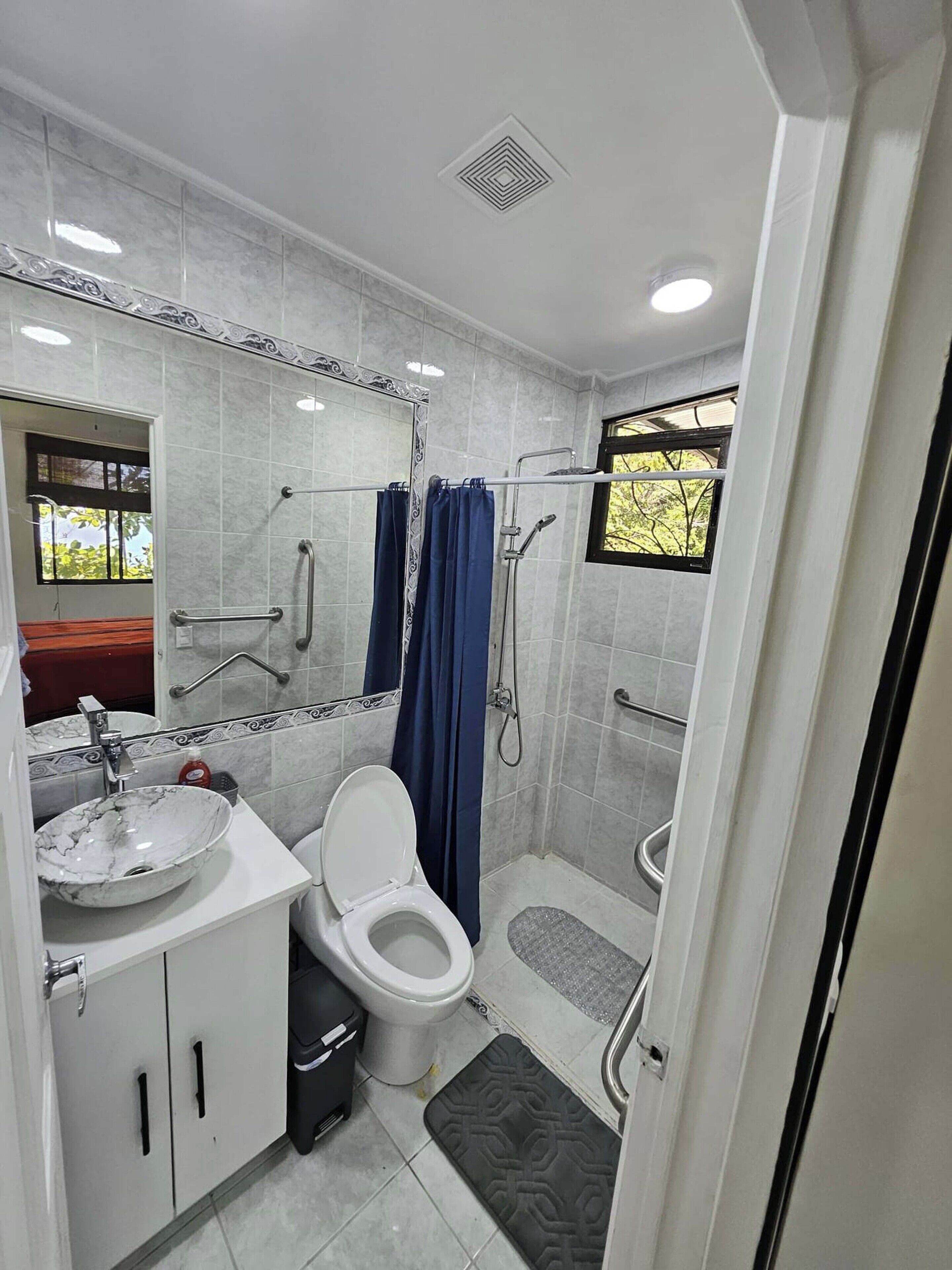 villa | bathroom | shower, rainfall showerhead, free toiletries, hair dryer