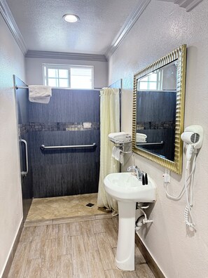 Standard Room, 1 Queen Bed | Bathroom | Shower, free toiletries, hair dryer, towels