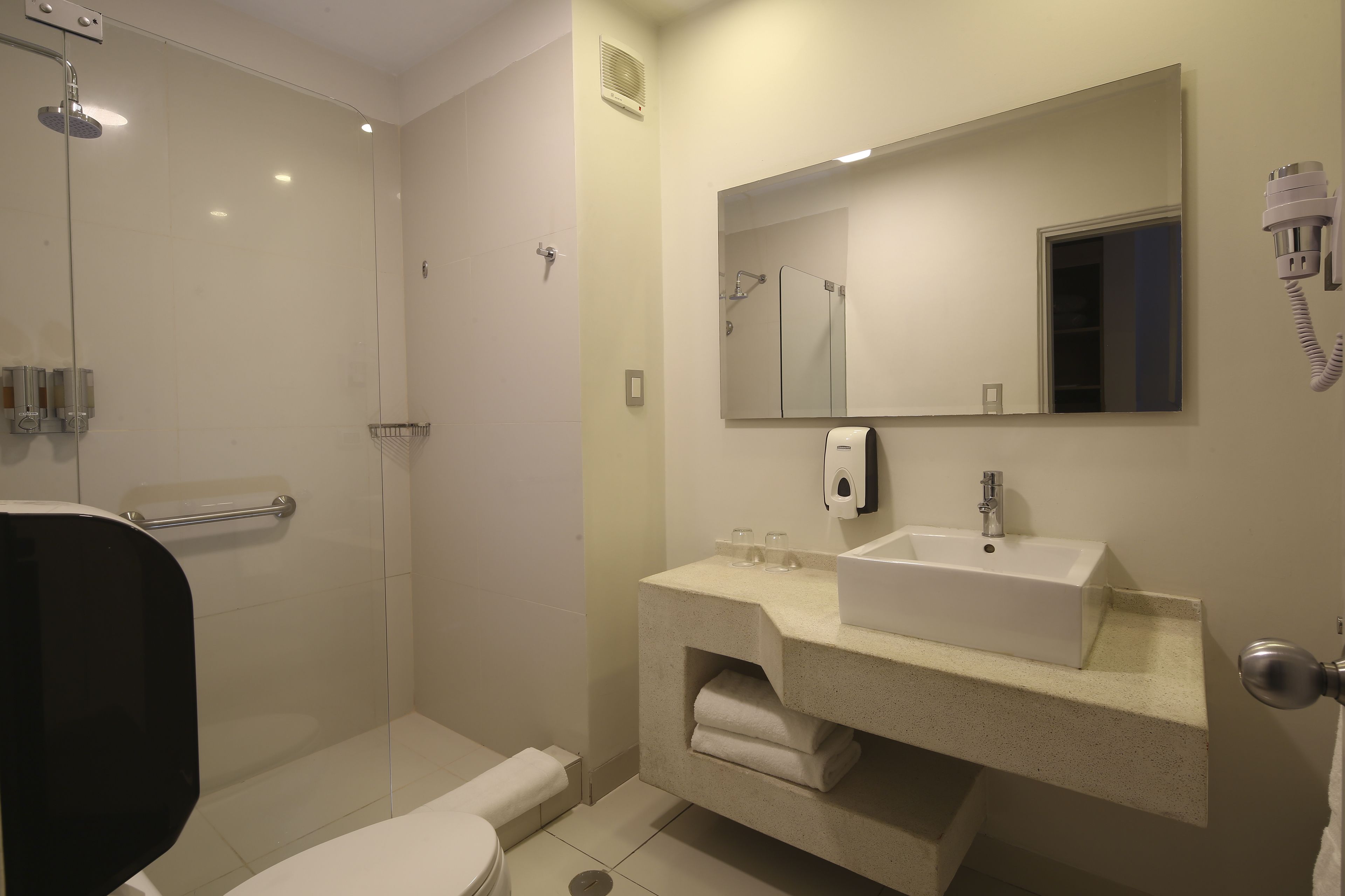 shower, designer toiletries, towels