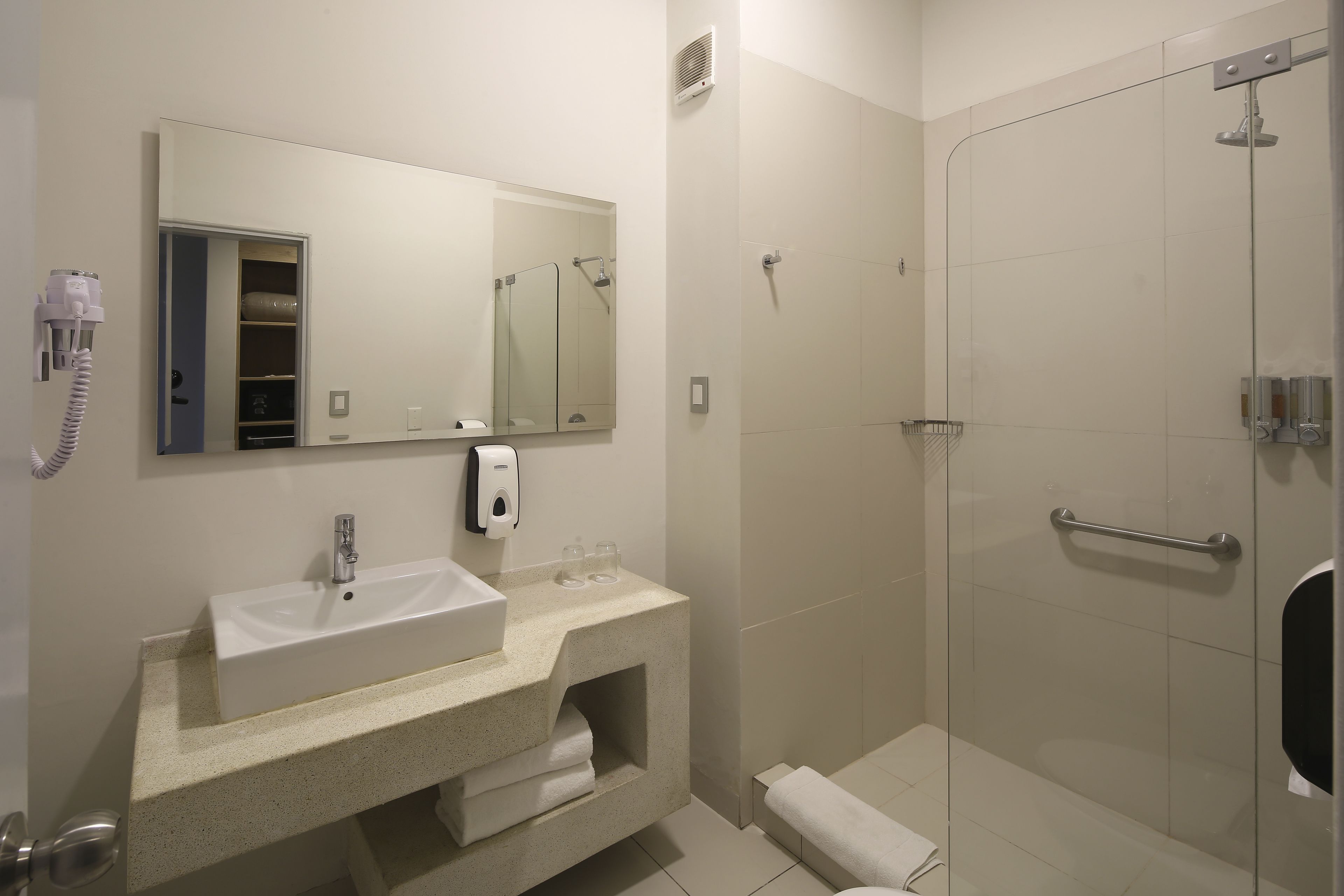 shower, designer toiletries, towels