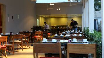 Daily buffet breakfast (USD 18 per person)