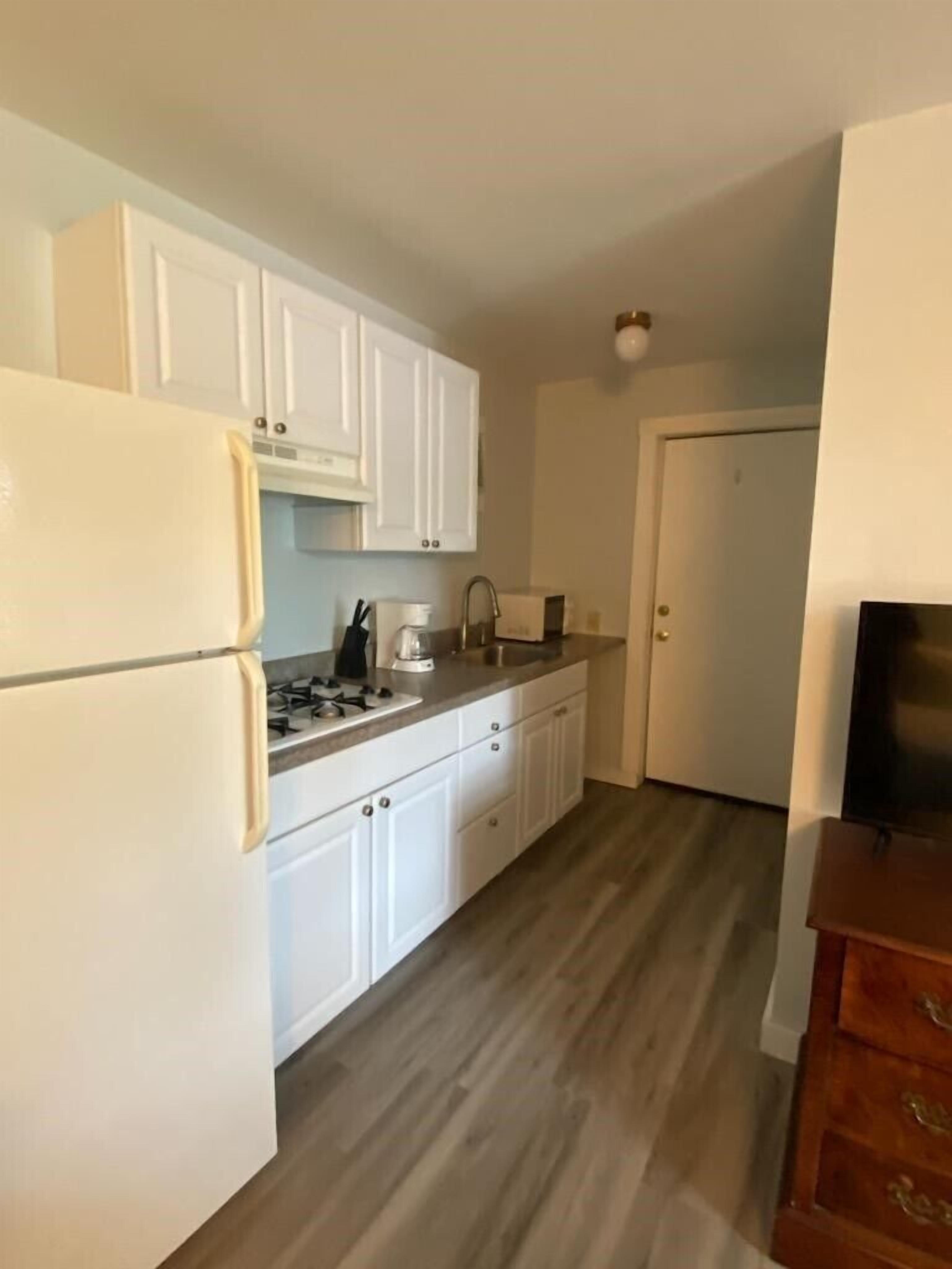 king room with kitchenette | private kitchen | fridge, microwave, coffee/tea maker, cookware/dishes/utensils