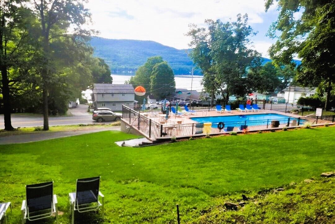 seasonal outdoor pool, pool umbrellas, pool loungers