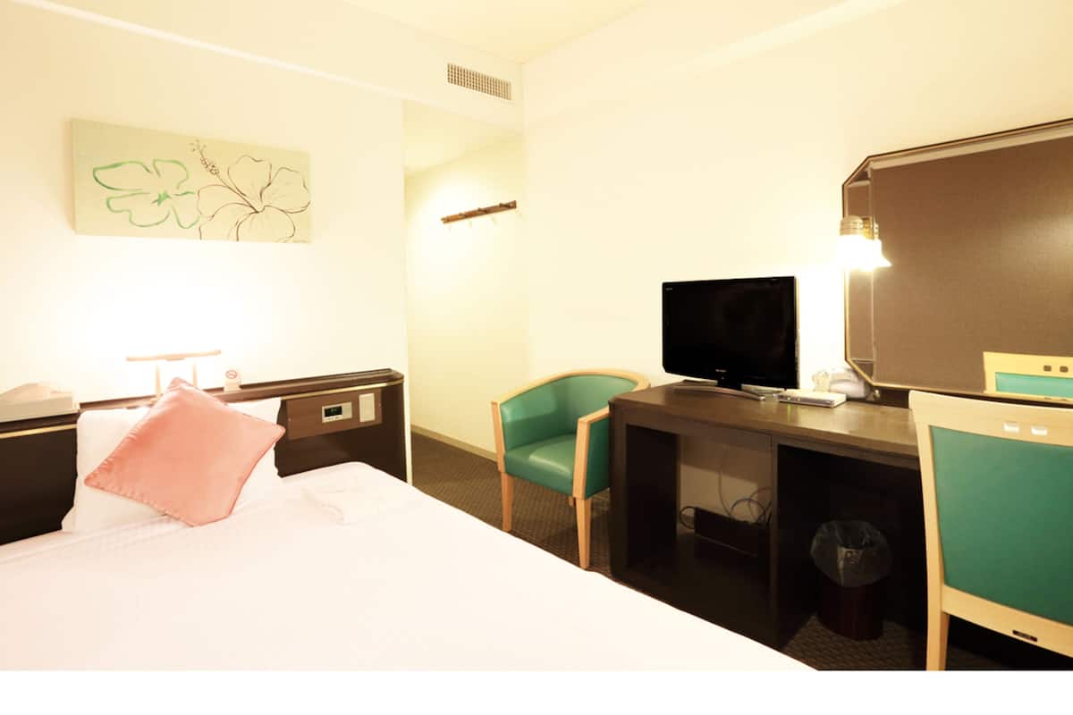 Desk, blackout curtains, free cots/infant beds, free WiFi
