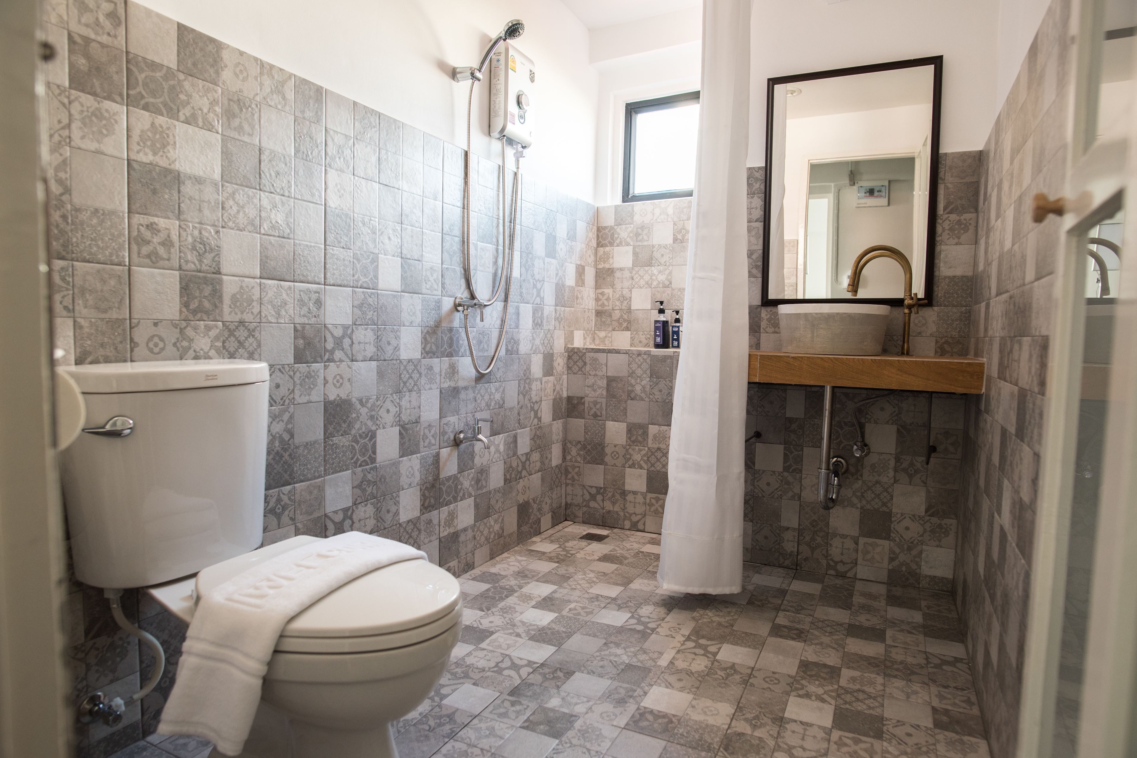 family room | bathroom | shower, free toiletries, hair dryer, towels