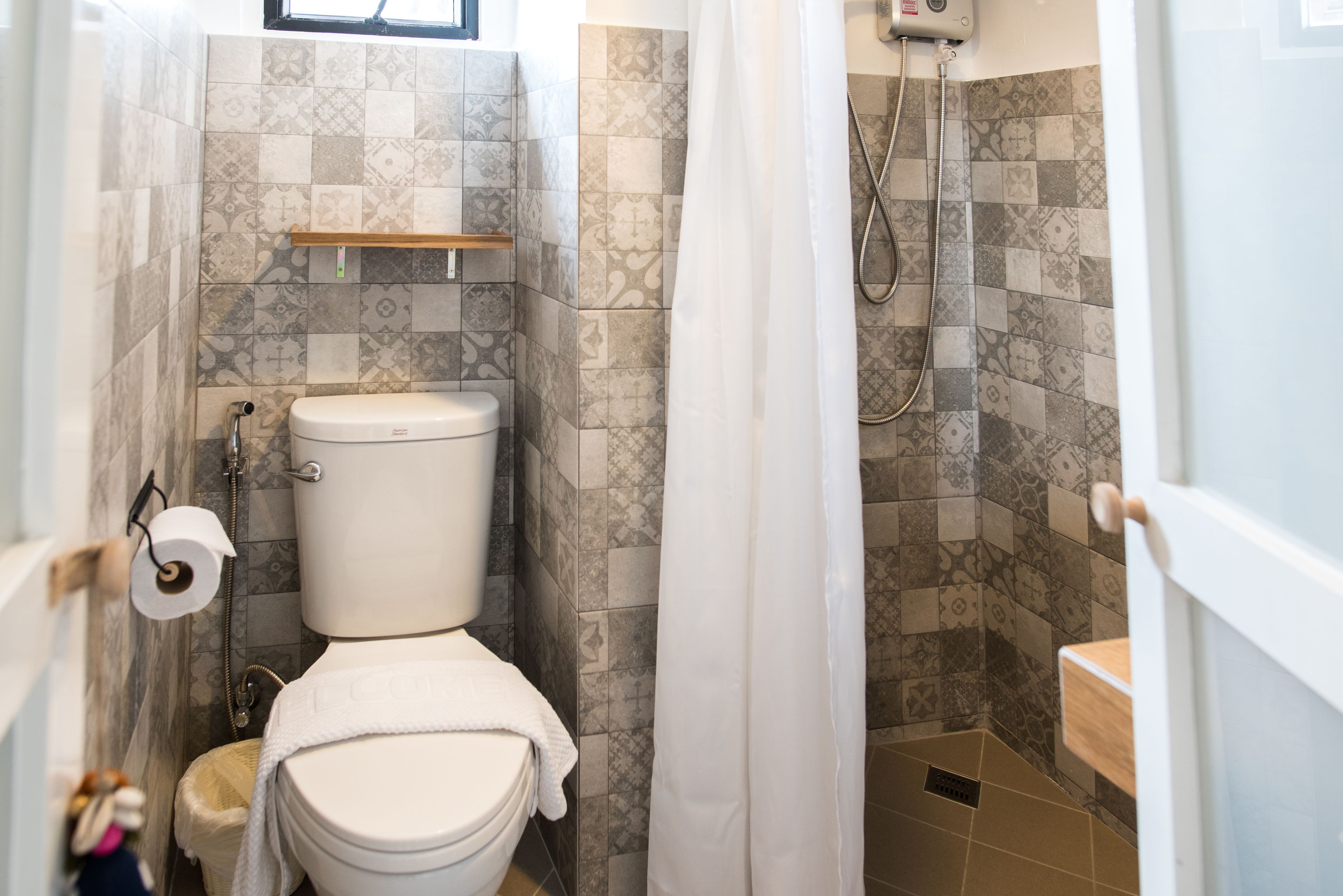 superior room type a with balcony  | bathroom | shower, free toiletries, hair dryer, towels