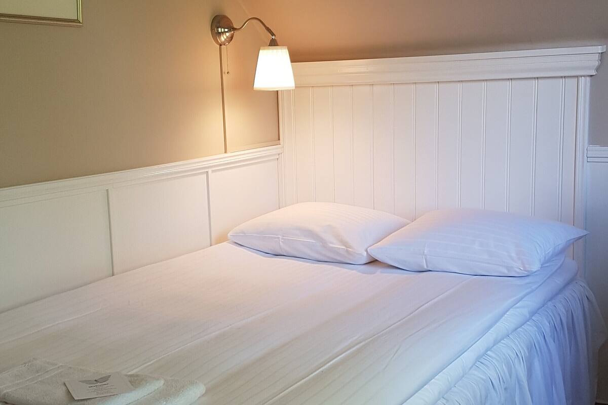 Habitación doble | Cunas o camas infantiles (de pago), wifi gratis, ropa de cama
