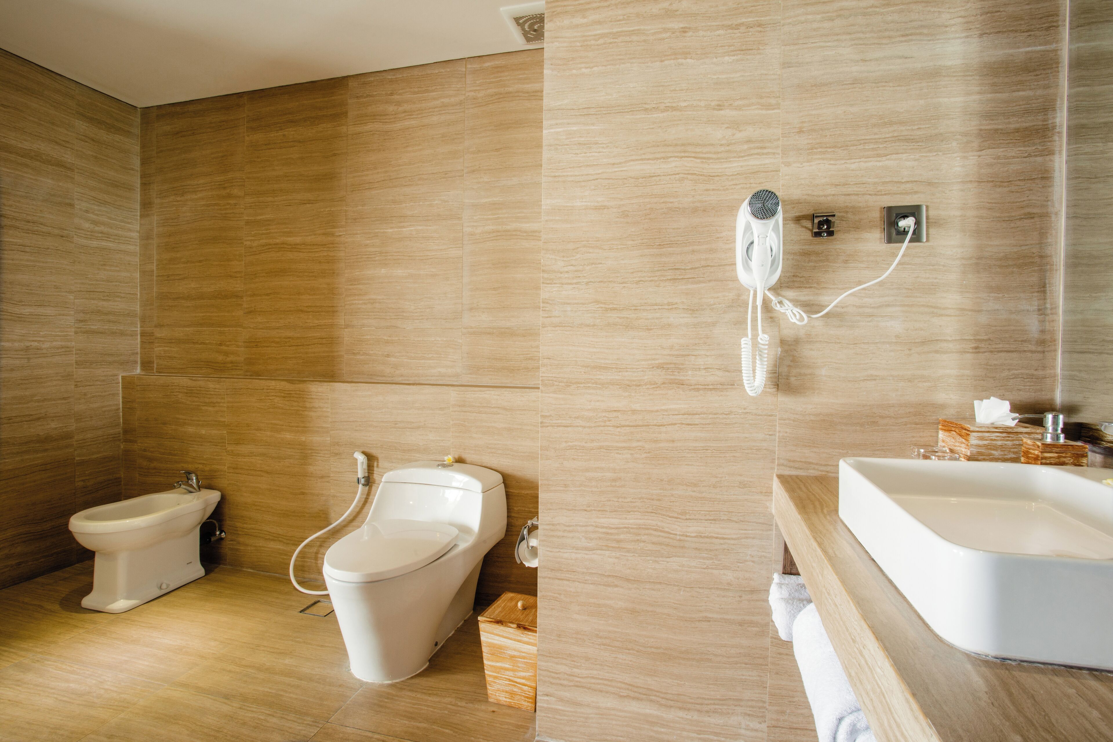 legong suite, bathtub & balcony | bathroom | separate bathtub and shower, rainfall showerhead, free toiletries