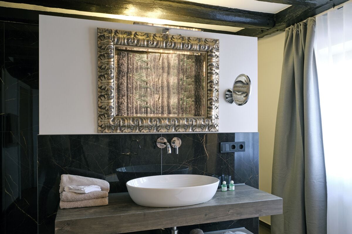 junior studio suite, 1 king bed, patio, garden view | bathroom | separate bathtub and shower, free toiletries, hair dryer, towels