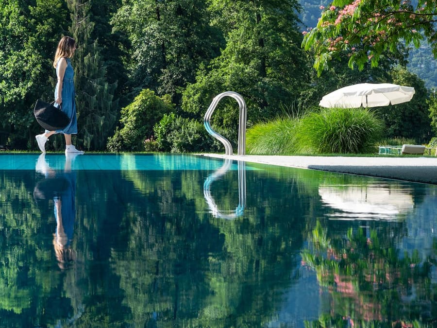 Indoor pool, seasonal outdoor pool, pool umbrellas, pool loungers