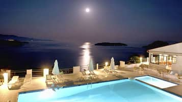 Outdoor pool, pool umbrellas, pool loungers