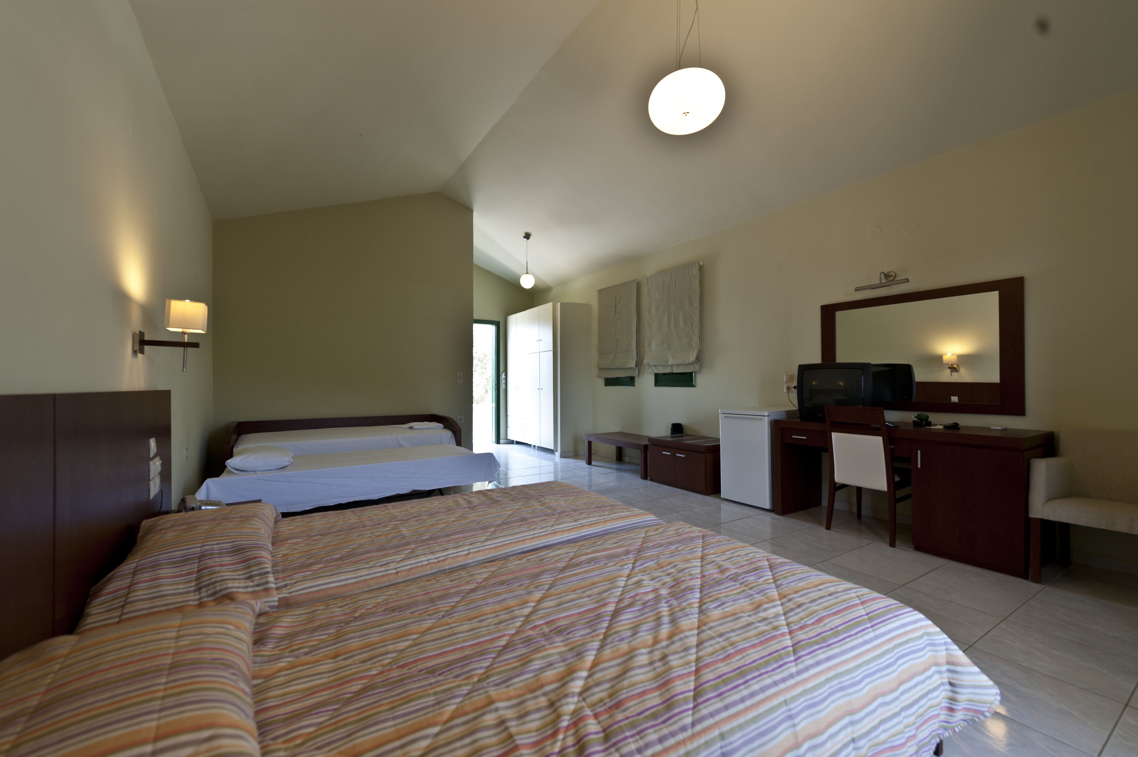 family room, sea view | in-room safe, desk, soundproofing, iron/ironing board