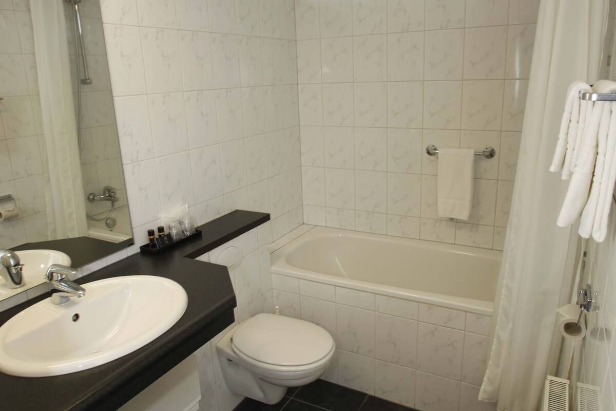 standard room | bathroom | designer toiletries, hair dryer, towels