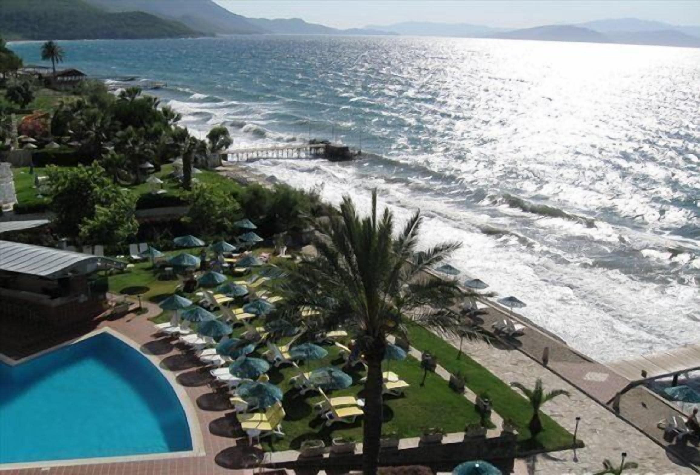 Outdoor pool, free cabanas, pool umbrellas