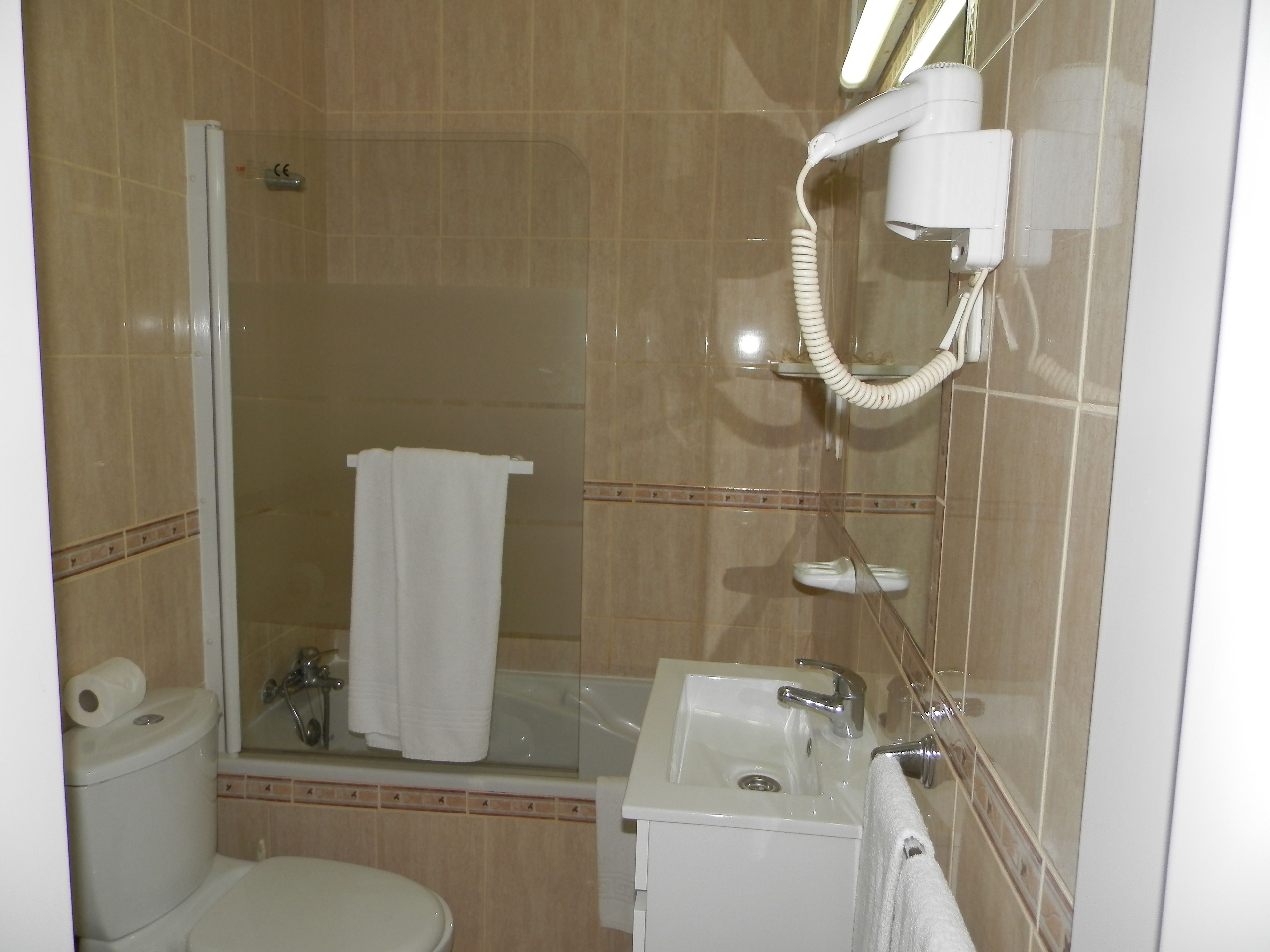 twin room | bathroom | shower, rainfall showerhead, hair dryer, towels