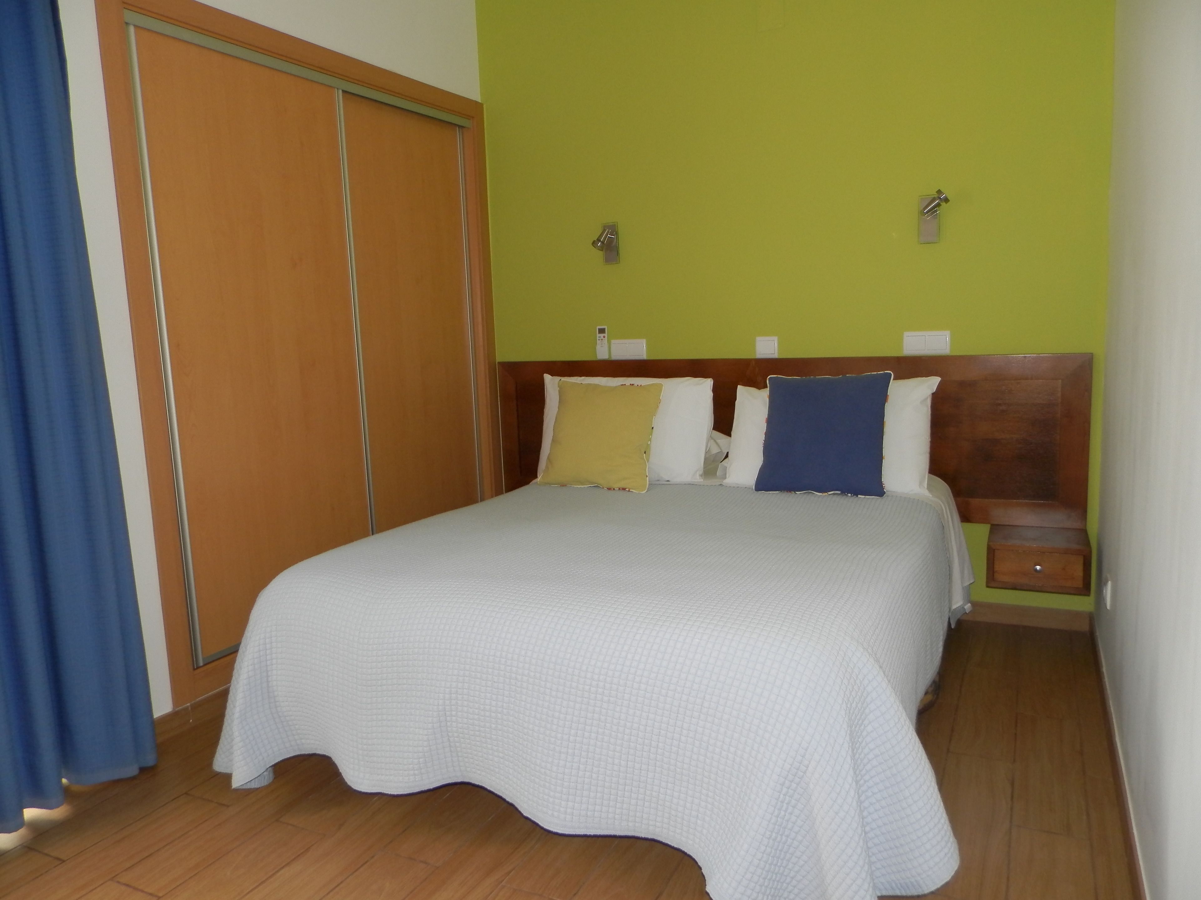 double room, balcony, partial sea view | in-room safe, desk, blackout curtains, iron/ironing board
