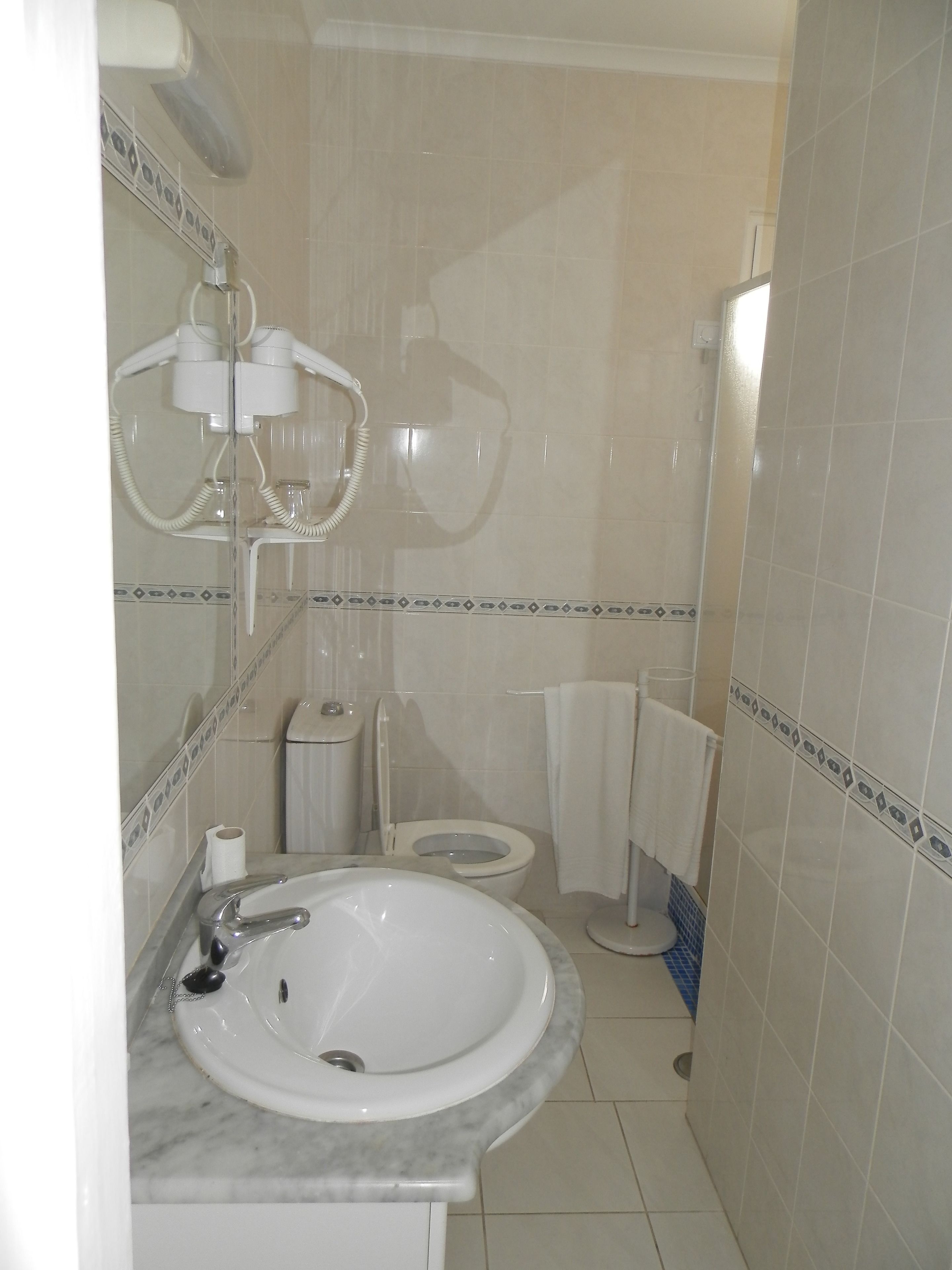 double room, balcony, partial sea view | bathroom | shower, rainfall showerhead, hair dryer, towels