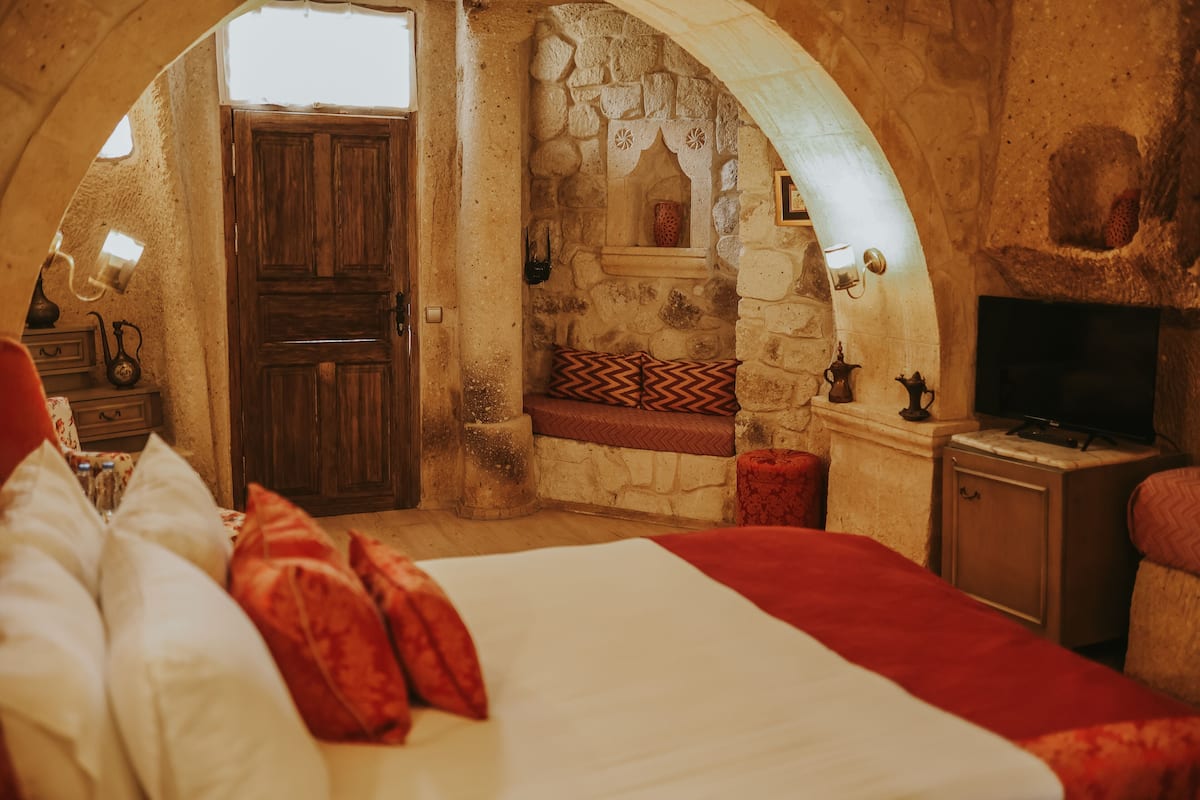 Junior Triple Room | Minibar, blackout drapes, soundproofing, iron/ironing board (on request)