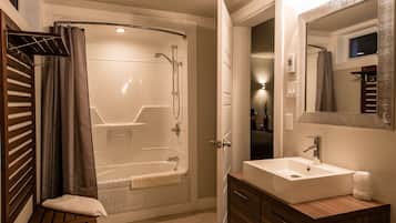 Family Room, 2 Queen Beds | Bathroom | Combined shower/tub, hydromassage showerhead, hair dryer, towels