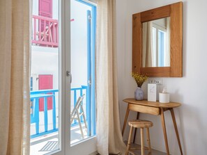 Junior Suite (street view) | Premium bedding, minibar, in-room safe, desk - Bluetopia Suites (Mykonos)