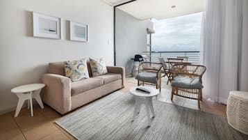 Appartement Deluxe, 1 chambre, balcon, vue mer | Coin séjour