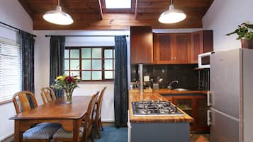 Family Apartment | Private kitchen | Full-size fridge, microwave, oven, stovetop