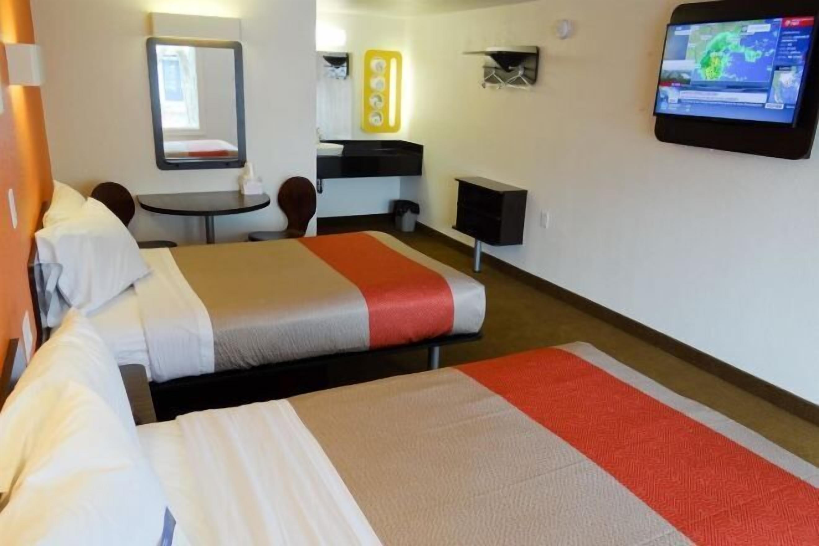 Laptop workspace, free WiFi, bed sheets