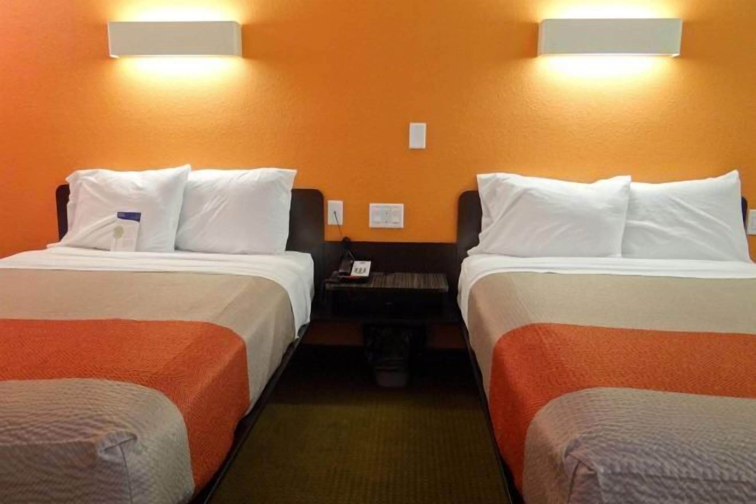 Laptop workspace, free WiFi, bed sheets