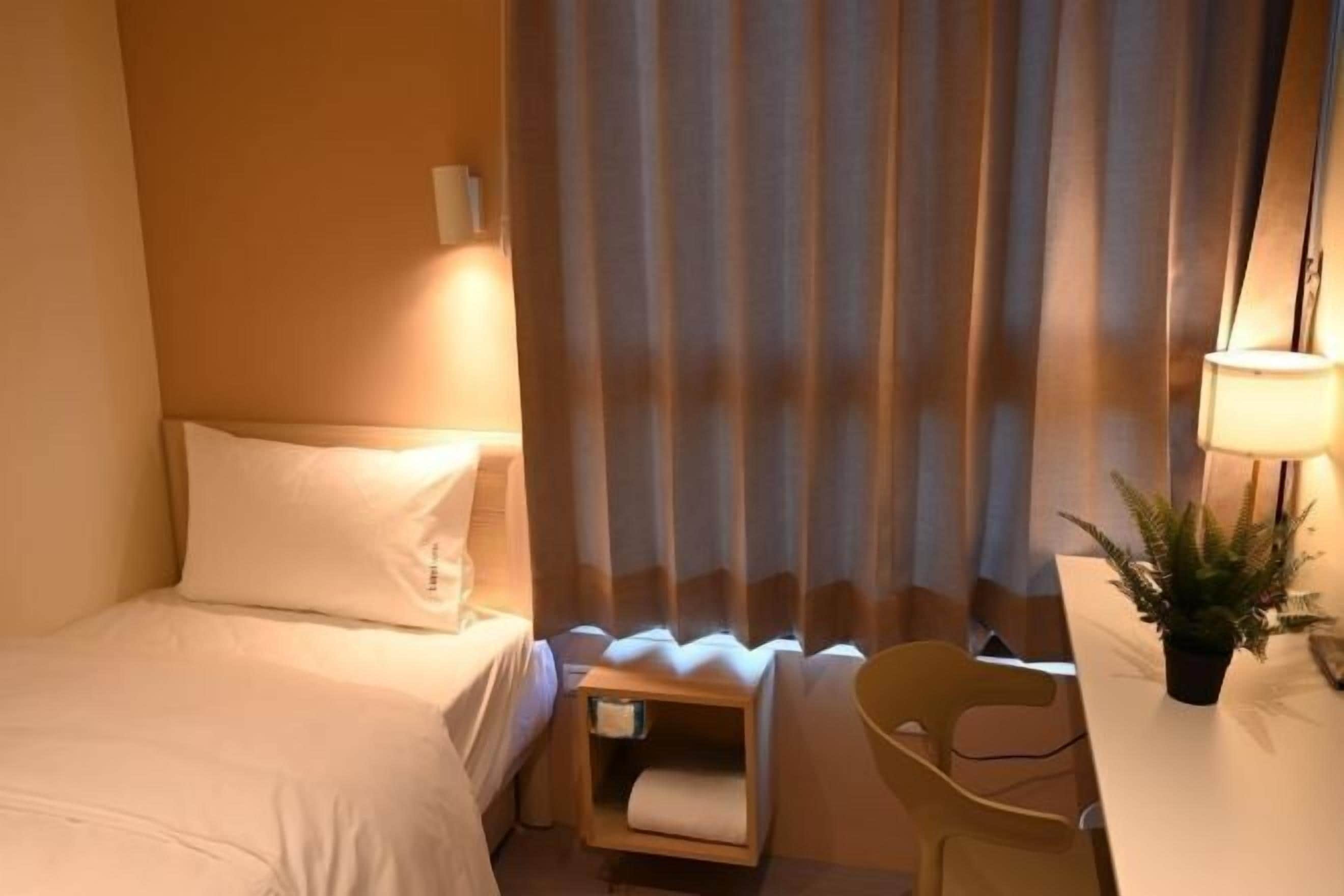 Premium bedding, down comforters, free WiFi, bed sheets