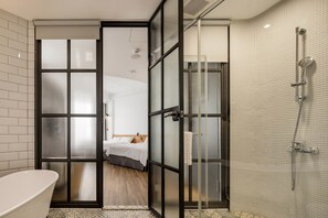 Superior Quadruple Room | Bathroom | Hair dryer, slippers, towels, soap - BlueSky Hotel (Taichung)