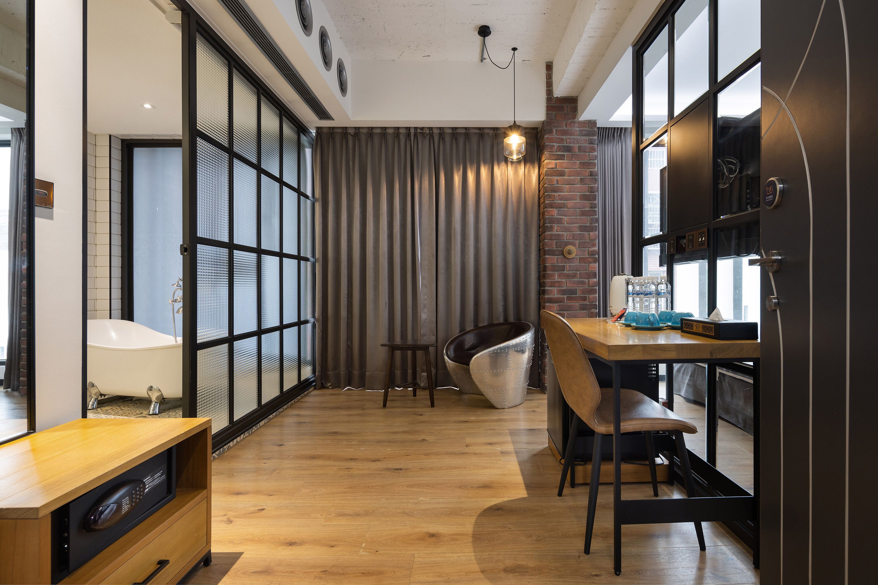 deluxe quadruple room | down duvets, minibar, desk, laptop workspace