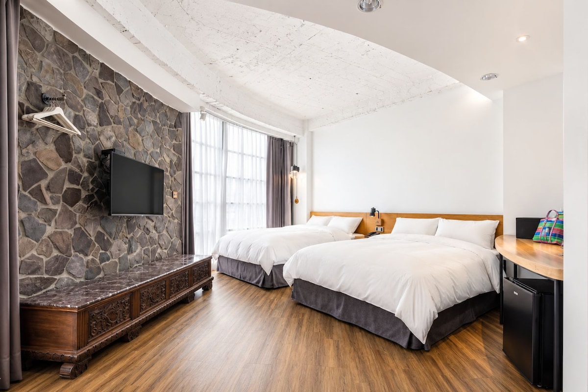 Deluxe Quadruple Room | Down comforters, minibar, in-room safe, desk