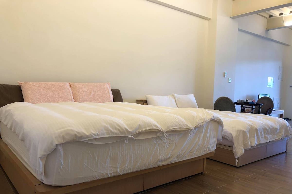 Family Room | Down duvets, blackout curtains, soundproofing, free WiFi