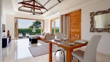 2x1-Bedroom Interconnecting Villa | Living area | 50-inch flat-screen TV with cable channels, TV