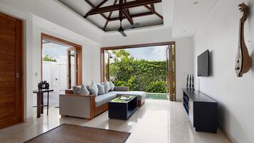 1 Bedroom Pool Villa | Living area | 50-inch flat-screen TV with cable channels, TV