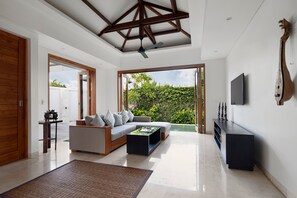 1 Bedroom Pool Villa | Living area | 50-inch flat-screen TV with cable channels, TV - Kokomo Resort Gili Gede (Gili Gede)