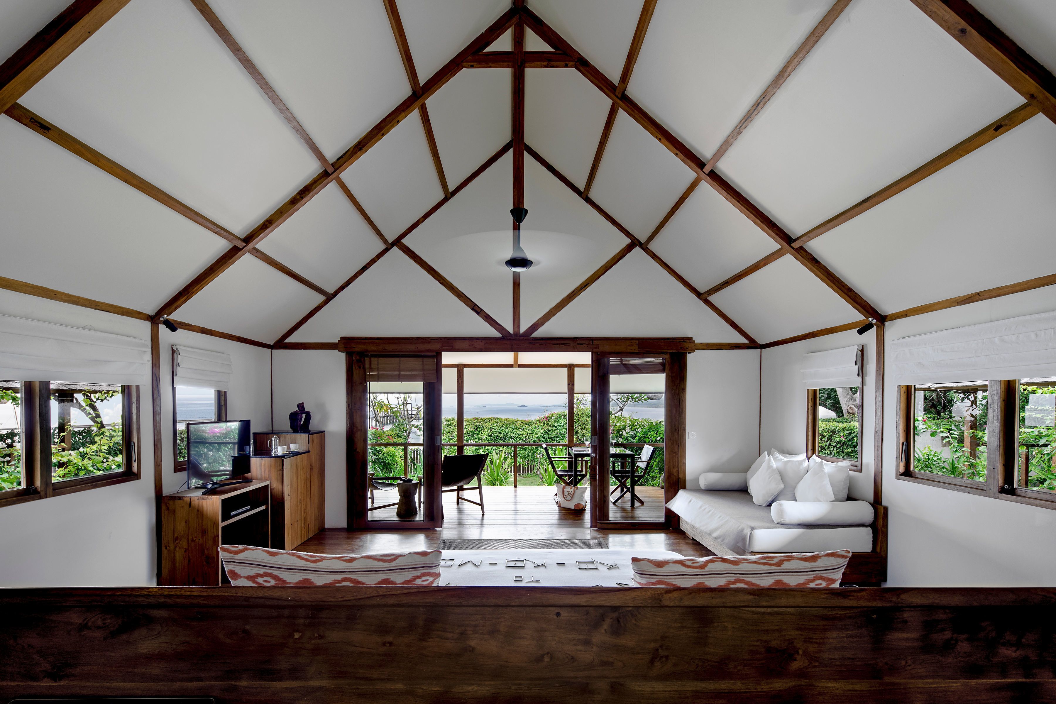 beachfront villa kecil | living room | 50-inch flat-screen tv with cable channels, tv