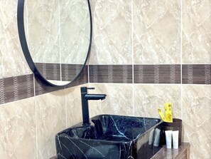 Shower, free toiletries, towels, soap