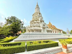 A temple with intricate carvings and a tiered roof structure. - RS guesthouse (Phnom Penh)