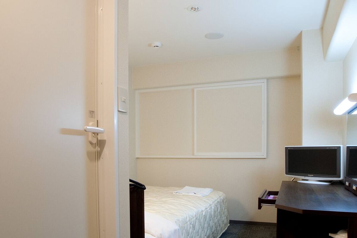 Desk, free WiFi, bed sheets