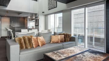 3 Bedroom Penthouse Suite S502 | Living area | Flat-screen TV