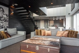 3 Bedroom Penthouse Suite S502 | Living area | Flat-screen TV