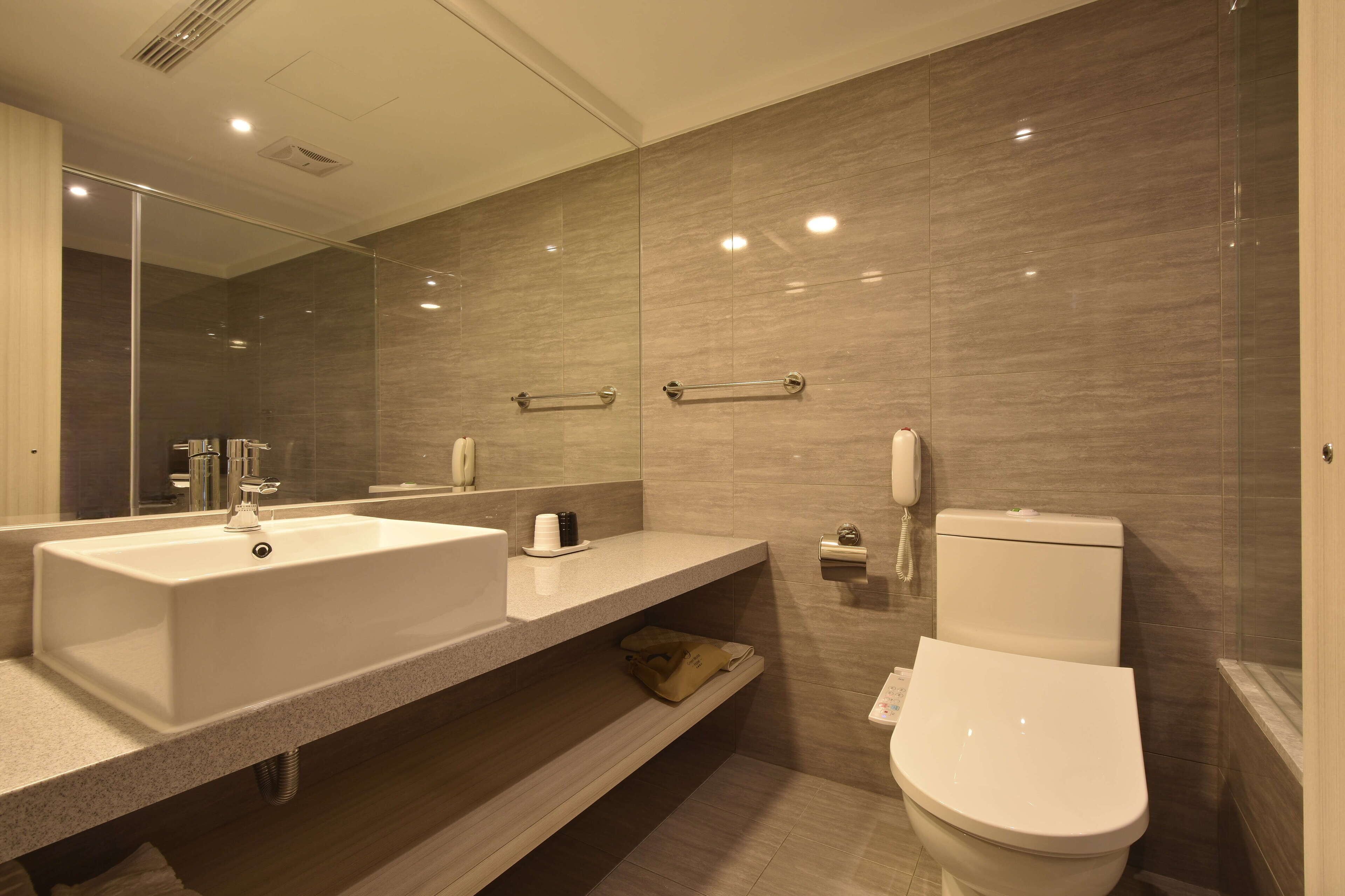 separate bathtub and shower, hair dryer, slippers, towels