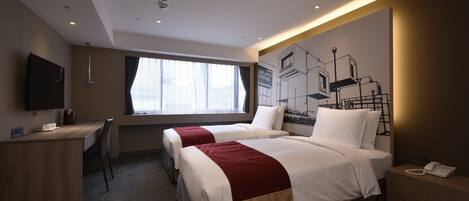 A hotel room with two beds, a desk, a chair, a TV, and a large window with curtains.