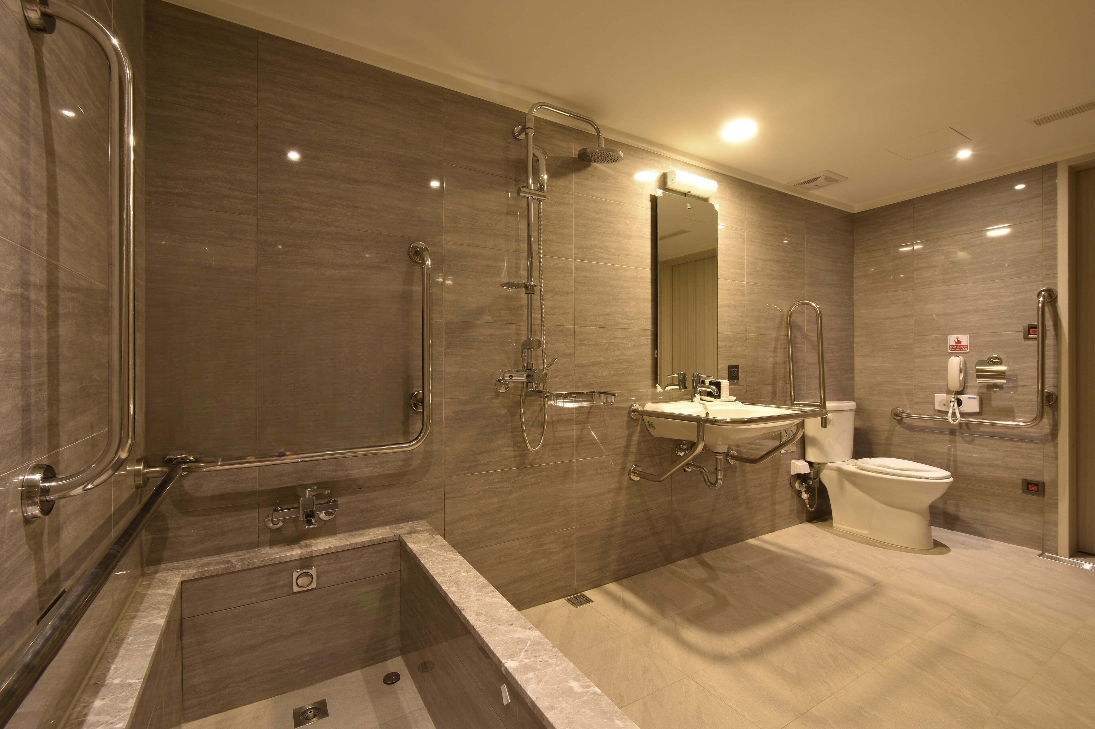 standard twin room, accessible, no windows | bathroom | separate bathtub and shower, hair dryer, slippers, towels