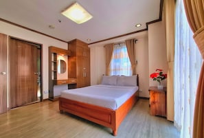 2-Bedroom Apartment at Bonbel Condominium | Individually decorated, individually furnished, desk, iron/ironing board