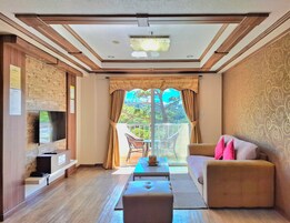 1-Bedroom Apartment at Bonbel Condominium | Living area | 36-inch flat-screen TV with cable channels, TV, table tennis