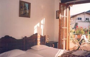 Habitación estándar | Tabla de planchar con plancha, wifi gratis, ropa de cama