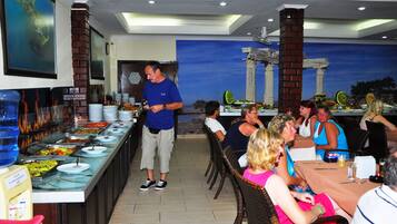 Breakfast, lunch, dinner served; international cuisine